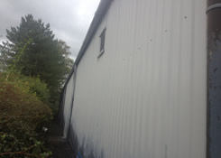 This image shows the cladding after being prepared and then sprayed with Rust-Oleum water based metal cladding primer.